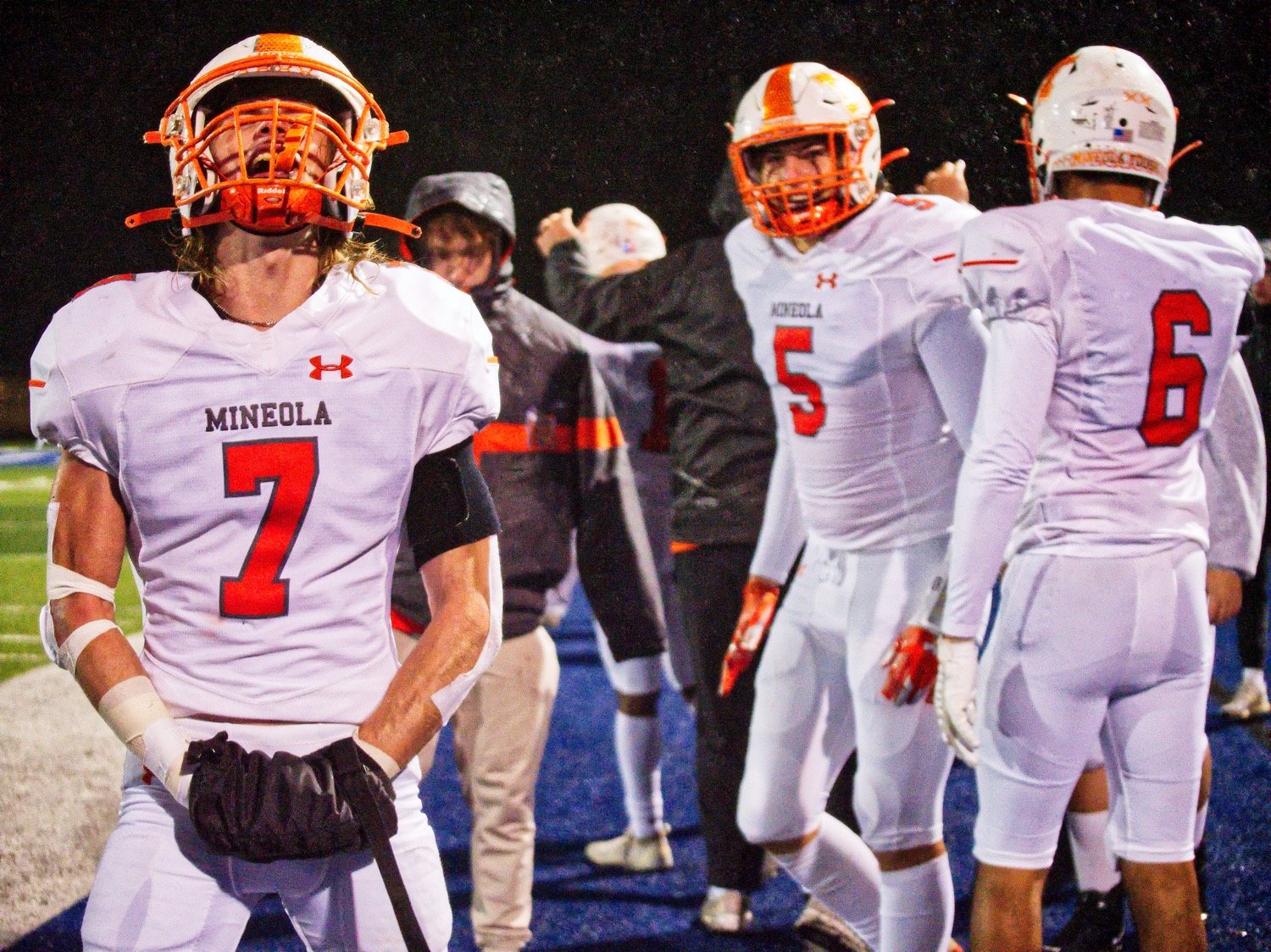 Adam Blalock lets out a jubilant yell as  Mineola clinches a bidistrict victory. [find more football photos]